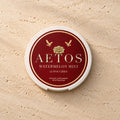 AETOS Watermelon Mint can on travertine