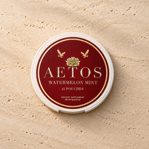 AETOS Watermelon Mint can on travertine