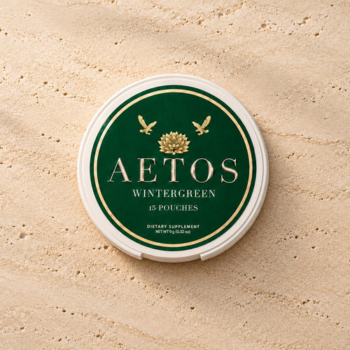 AETOS Wintergreen can on travertine